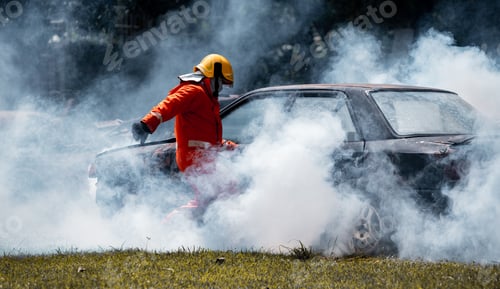 Preview: Fireman wearing safety uniform help car crash accident with axe for rescue victim life on fire and t