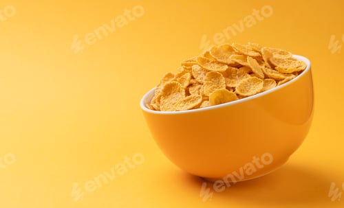 Preview: Ceramic bowl of corn flakes on yellow background