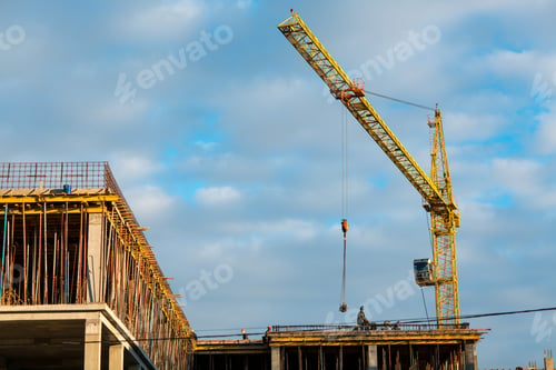 Preview: Building construction house with crane concept. Blue sky background.