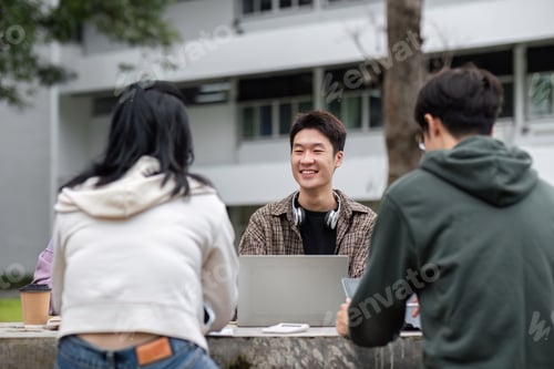 Preview: Students Gather in Groups to Study for Exams Outdoors at University Campus