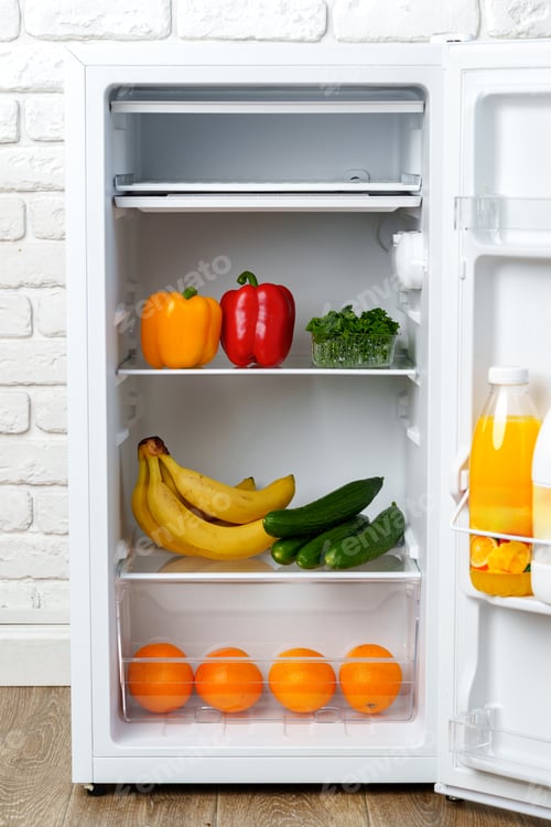 Preview: Open Refrigerator With Fresh Produce and Juice
