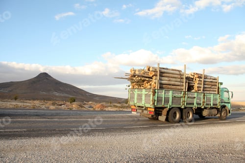 Preview: The truck is carrying timber. Timber export and shipping concept.