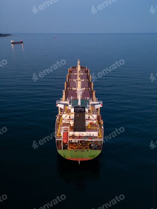 Preview: Large bulk carrier cargo ship Floating on Vast Water