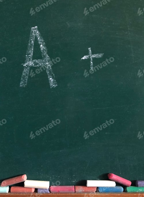 Preview: A+ on a green chalk board with coloured chalk stick