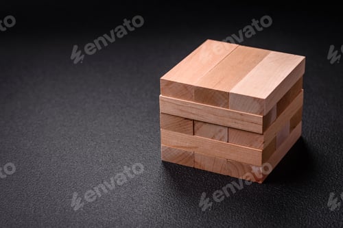 Preview: Wooden blocks of Jenga game as a concept idea of risk in achieving a goal
