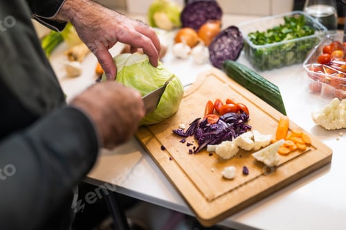 Preview: Chef working in kitchen