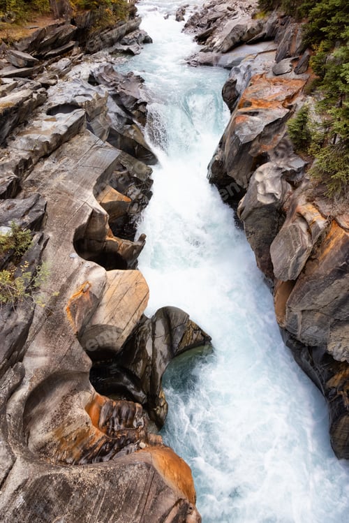 Preview: Fresh Water rushing in a canyon. Canadian Nature Background