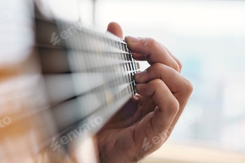 Preview: Young Musician Playing Guitar At Home