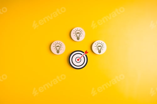Preview: Target goal and light bulb icons on background