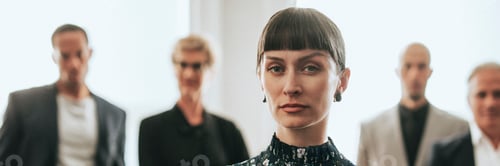 Preview: Confident business people standing together