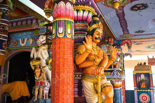 Preview: Part of a beautiful and colorful Indian temple in Mauritius Island. Close-up on sculptures and