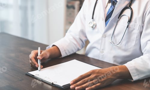 Preview: Close up of doctor sitting hands at the table and writing a prescription, Healthcare and medical.