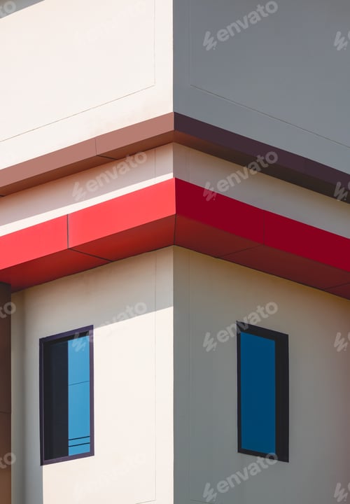 Preview: Light and shadow on geometric pattern surface of modern house building wall in symmetric view