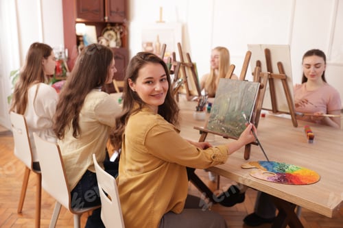 Preview: Group of women learning to draw at table in class