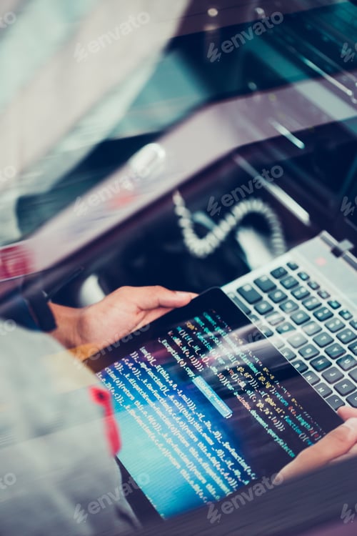 Preview: Hacker using computer, smartphone and coding to steal password and private data remotely from car