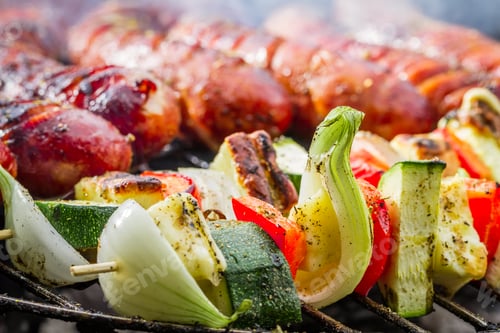 Preview: Sausages and skewers on the grill