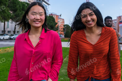 Preview: Two young friends together outdoors in lifestyle session