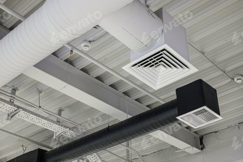 Preview: Two ventilation duct systems with grilles under ceiling in commercial building. Supply and exhaust