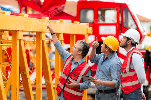 Preview: Foreman and worker on construction crane inspection is made to transport the crane