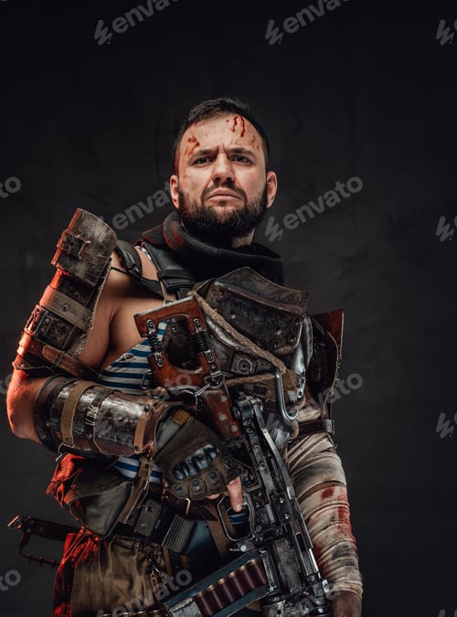 Preview: Serious survival poses in dark background holding shotgun
