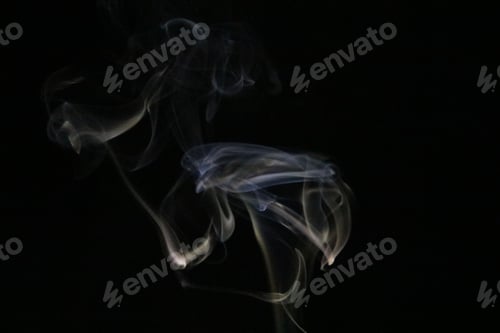 Preview: Closeup of incense smoke isolated on a black background for overlays and textures