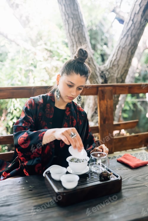 Preview: Process brewing tea. Woman steeping herbal tea