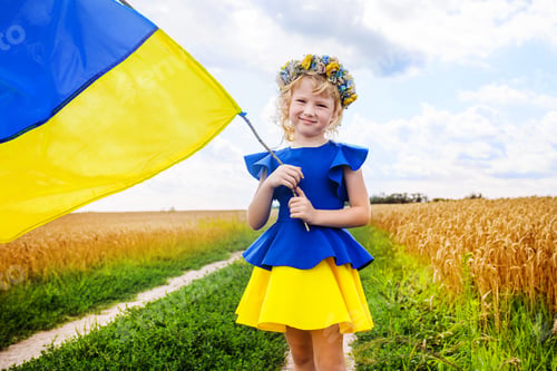 Preview: Patriotic girl showcasing Ukrainian national flag