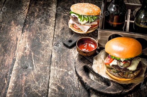 Preview: Street food. Fresh burgers with a box of beer.