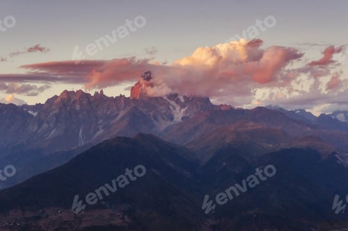 Preview: Autumn landscape and snow-capped mountain peaks. View of the mou