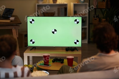 Preview: Green screen TV with couple watching movies on sofa