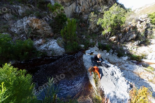 Preview: Teenage girl and younger brother hiking the Waterfall Trail, Stanford, South Africa.