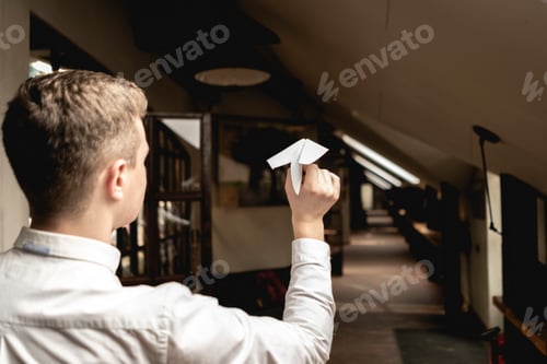 Preview: cheerful office worker throw paper plane