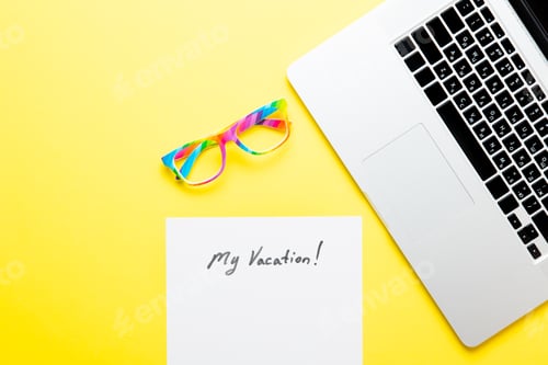 Preview: paper My Vacation, laptop and glasses