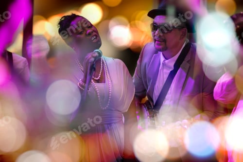 Preview: Band playing with woman singing