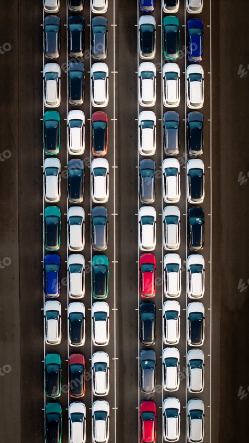 Preview: Aerial view directly above new cars ready for export