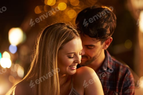 Preview: He makes me feel safe and at home. Shot of a young couple out on a date in the city.