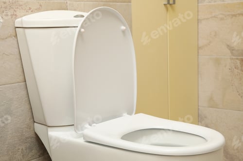 Preview: Toilet bowl in modern bathroom in light beige color