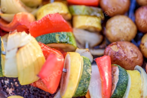 Preview: Veggie kabobs and potatoes on the grill in summertime
