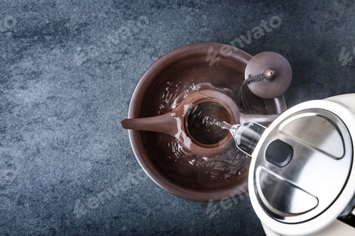 Preview: Kettle for tea ceremony on a blue stone table