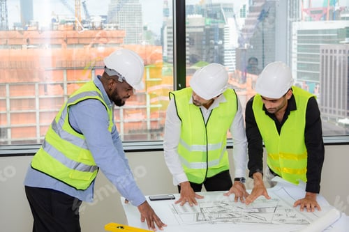 Preview: professional engineer construction foreman team discussion working in business industry architect