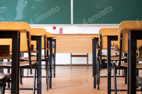 Preview: Classroom With Empty Desks and Chalkboard
