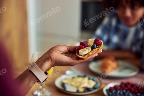Preview: Eating delicious sweet breakfast at home.