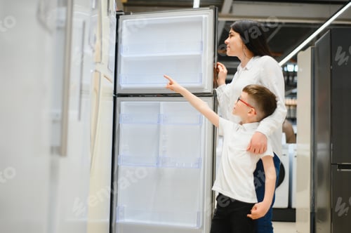 Preview: family uying domestic refrigerator in supermarket