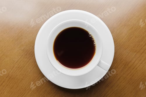 Preview: Overhead View of Coffee in White Cup