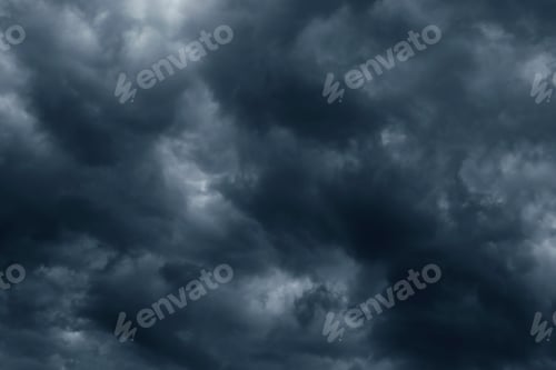 Preview: Dramatic stormy sky background. Dark fluffy cloudy sky. Moody spooky cloudscape.