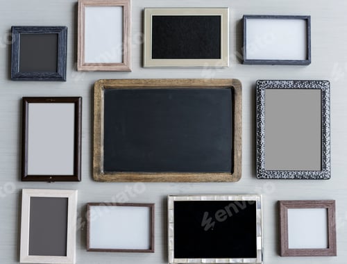Preview: Set of Blank Photo Frames Hanging on Gray Wall