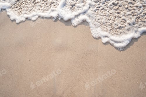Preview: Soft ocean wave on tropical sandy beach in summer