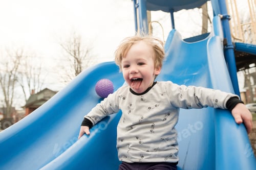 Preview: Boy playing on slide