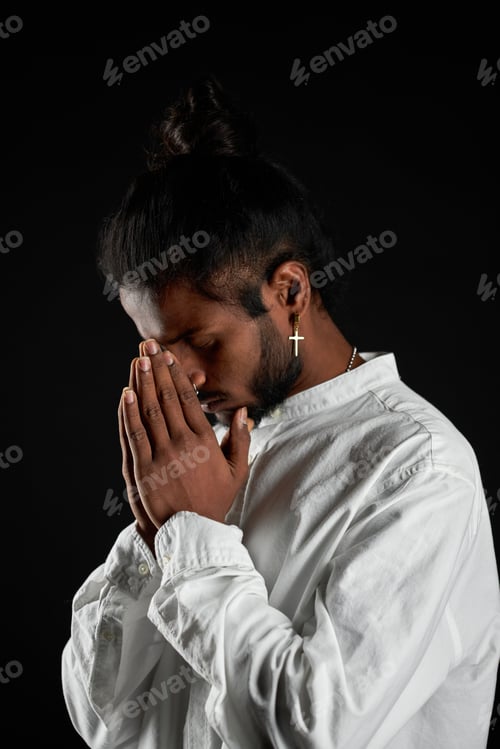 Preview: Religious Young Indian Man in White Shirt