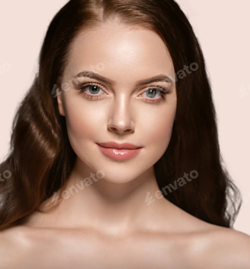 Preview: Beautiful hair skin woman beauty female portrait natural make up long hair. Color background yellow